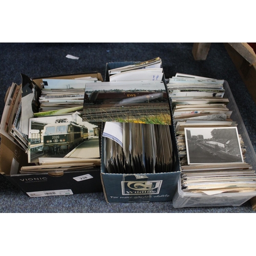 238 - Three boxes containing vintage postcards and photographs of buses and trains.