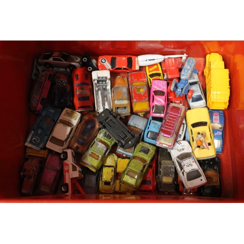 241 - Two boxes containing vintage die-cast vehicles, mostly playworn, to include saloon cars, a transport... 