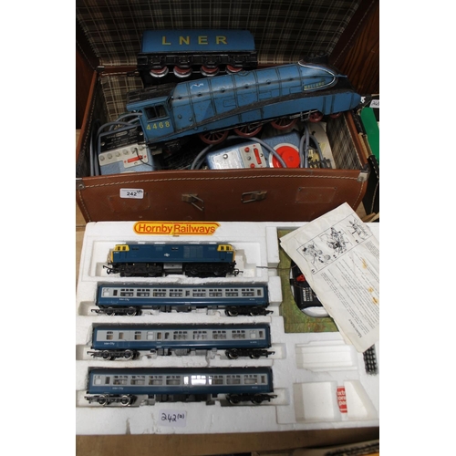 242 - Hornby OO gauge model railways to include a diesel locomotive in box with Intercity carriages, a sui... 