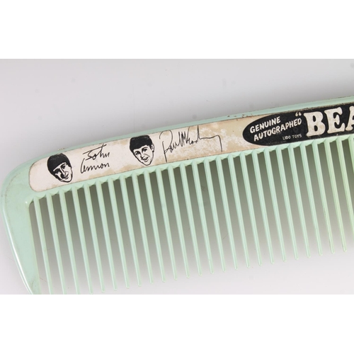 361 - 1960s large Beatles comb with facsimile signatures, a pair of 1960s Beatles socks and Beatles magazi... 