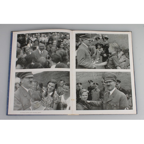 369 - German book of Hitlers Daily Work containing images, etc.