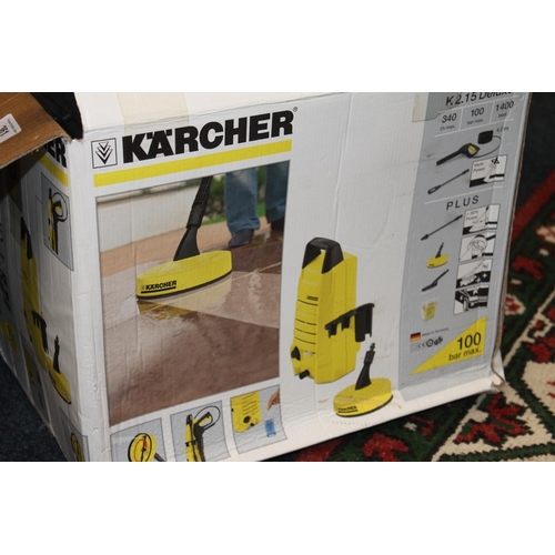 405 - Boxed Karcher K2.15 Deluxe and two bottles of Karcher car shampoo and stone cleaner.