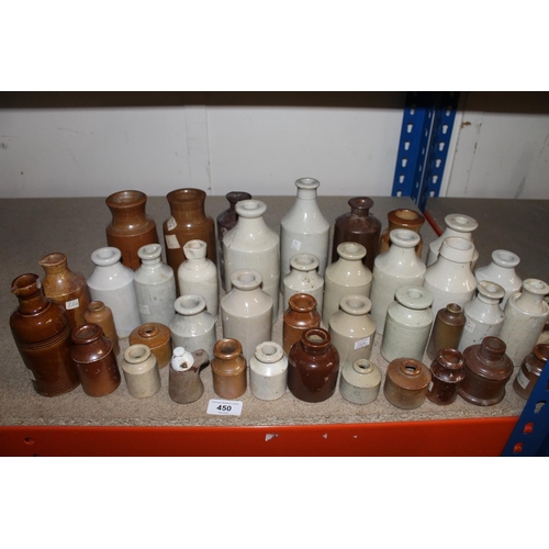 450 - Antique stoneware bottles.