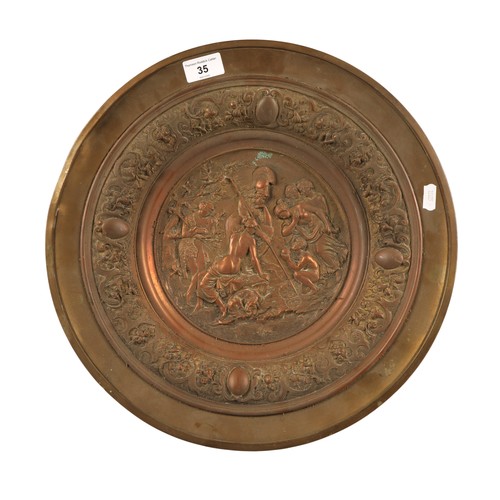 35 - Brass and copper decorative charger with classical figures. 40cm