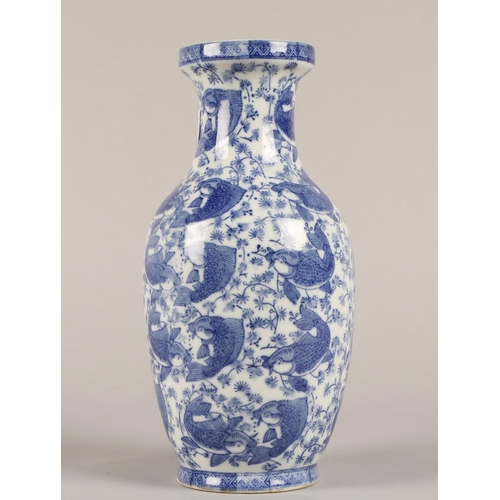 16 - Japanese blue and white baluster vase decorated with carp. 32cm