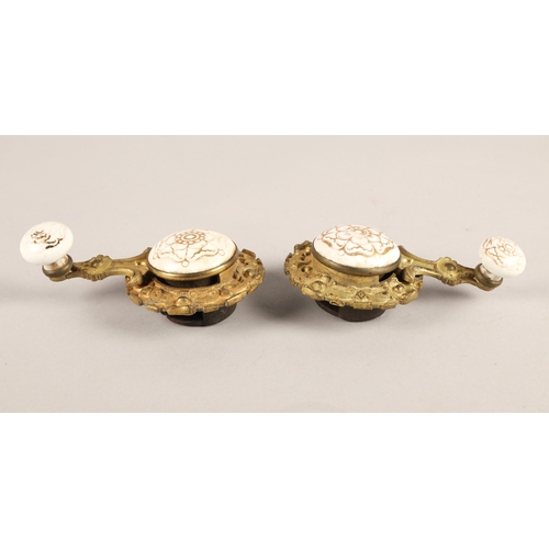 43 - Pair of ceramic and brass servant call levers