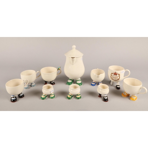 6 - Collection of Carlton Ware Walking Ware to include coffee pot, five mugs, cream jug, and three egg c... 