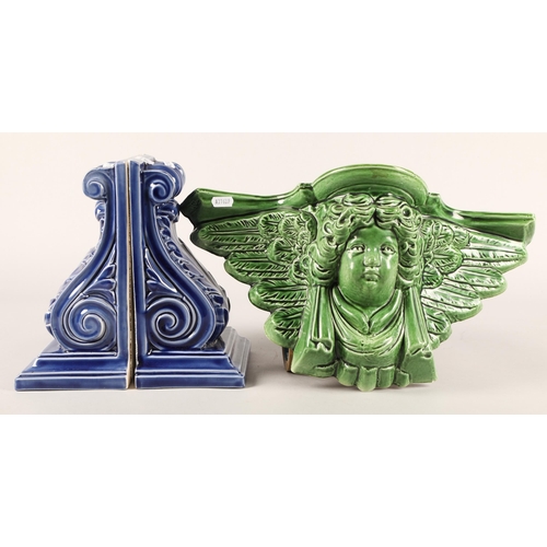 297 - Albion Ceramics two blue glazed wall pockets and a green in the form of a cherub 