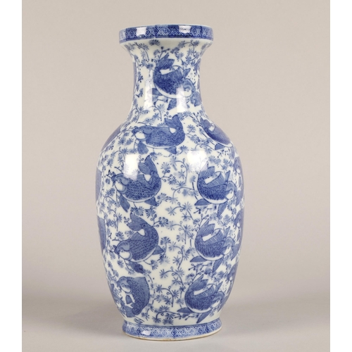 16 - Japanese blue and white baluster vase decorated with carp. 32cm