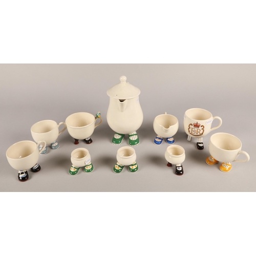 6 - Collection of Carlton Ware Walking Ware to include coffee pot, five mugs, cream jug, and three egg c... 