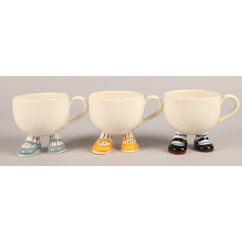 6 - Collection of Carlton Ware Walking Ware to include coffee pot, five mugs, cream jug, and three egg c... 