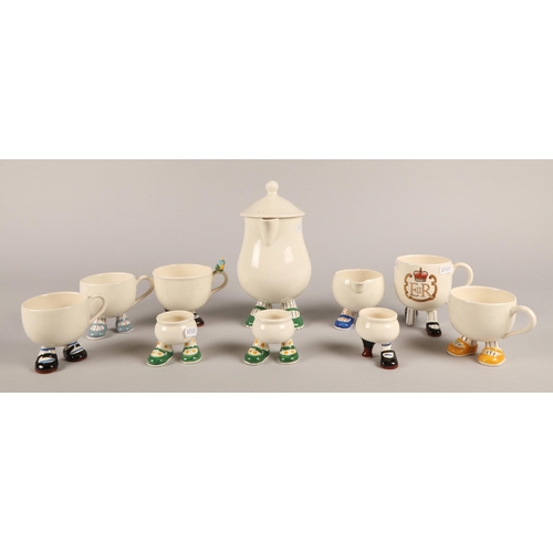 6 - Collection of Carlton Ware Walking Ware to include coffee pot, five mugs, cream jug, and three egg c... 