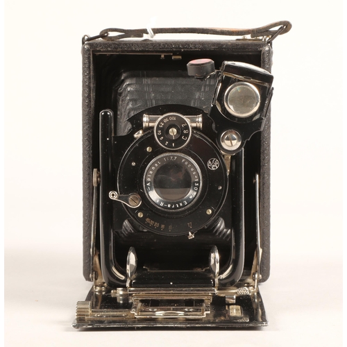 40 - Vintage folding camera in leather bag with  slides.