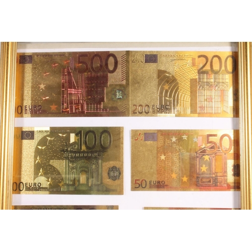 673N - Framed display of European Euro banknotes and an American $100 one hundred dollar bill in gold tone.