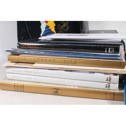 649 - P&O Oriana interest, items including three black leatherette albums of postcards, Oriana book, P... 