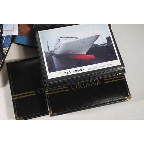 649 - P&O Oriana interest, items including three black leatherette albums of postcards, Oriana book, P... 