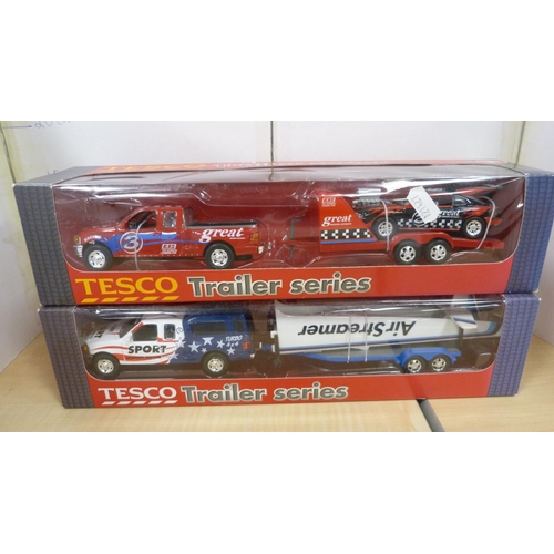 10 - Five boxed model vehicles including Coca-Cola truck, tipping truck etc.