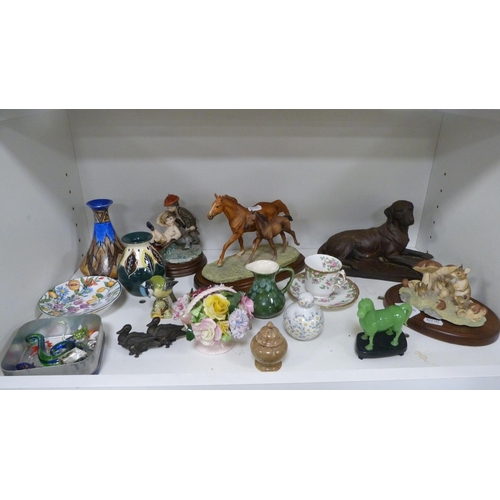 101 - Collection of figures to include a resin model of a dog, cabinet cup and saucer, Beswick bird model ... 