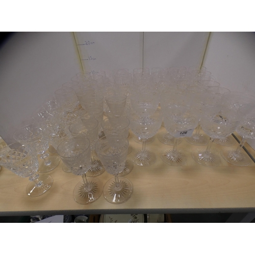 126 - Suite of cut glass drinking glasses to include red wine, white wine, sherry etc.