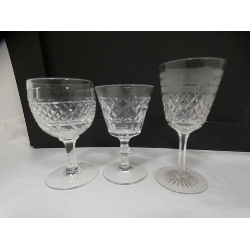 126 - Suite of cut glass drinking glasses to include red wine, white wine, sherry etc.