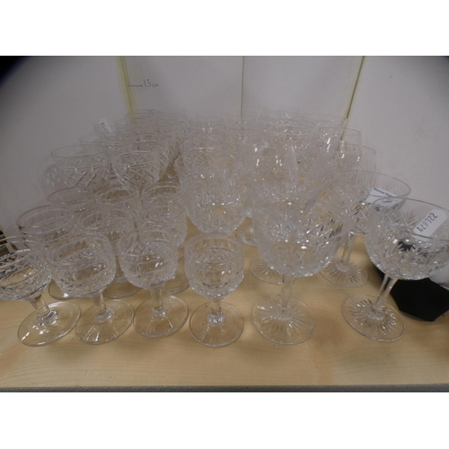 128 - Suite of various cut glass wine glasses and others.