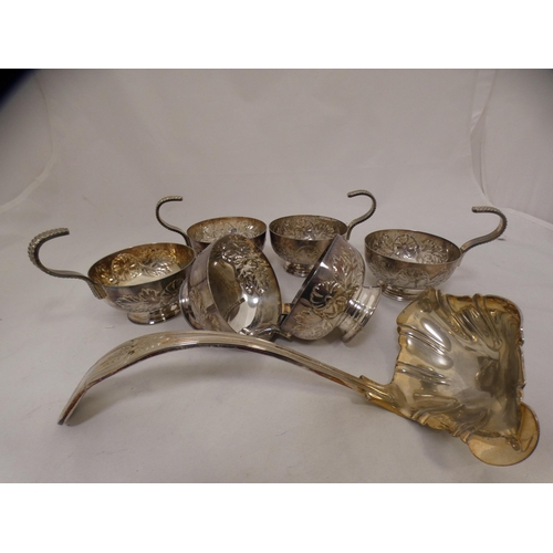 129 - Large EP on copper punch bowl with ladle and six cups.