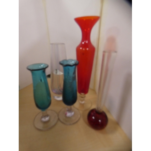 131 - Glass rolling pin, three glass paperweights, vases etc.