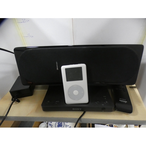 132 - Apple iPod and a Sony iPod dock with remote control.