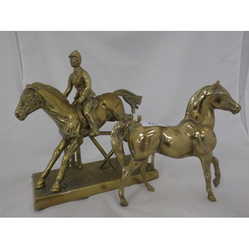 161 - Two brass models of horses.