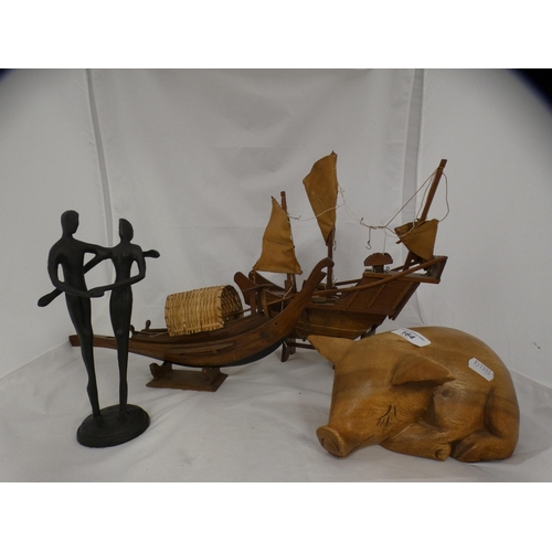 164 - Carved wooden model of a pig, wooden boats etc.