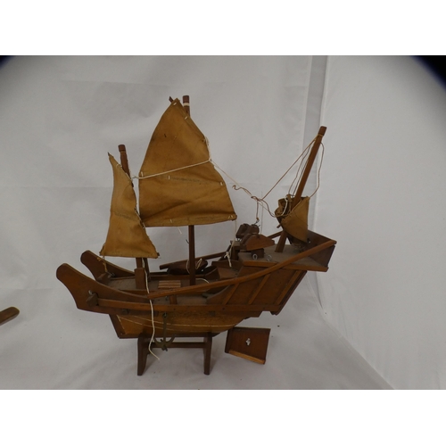 164 - Carved wooden model of a pig, wooden boats etc.