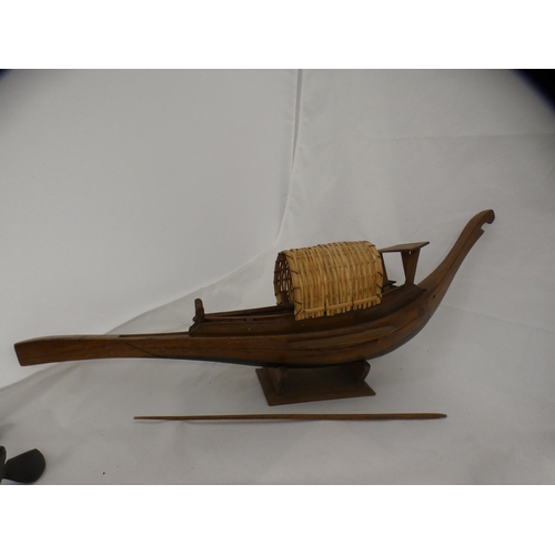 164 - Carved wooden model of a pig, wooden boats etc.