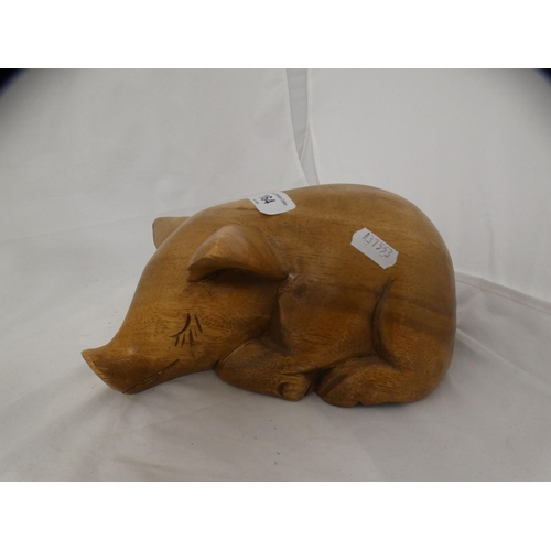 164 - Carved wooden model of a pig, wooden boats etc.