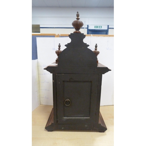 17 - Antique oak-cased mantel clock.