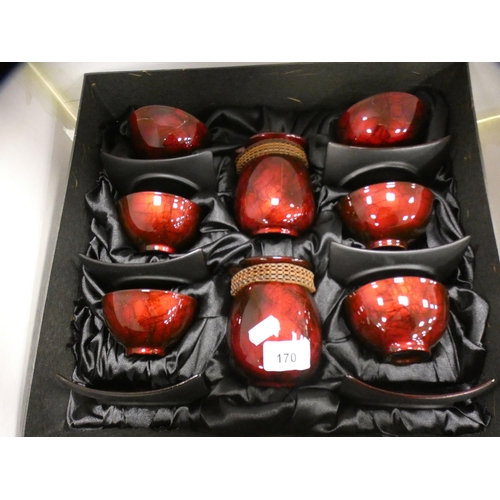 170 - Taiwan lacquered tea bowl set and two reproduction Chinese teapots.