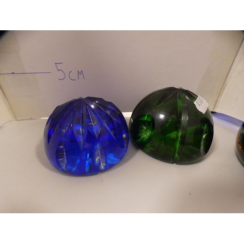 176 - Four pieces of blue coloured glass and five various paperweights to include Mdina.