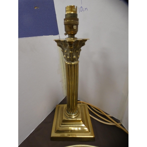 200 - Brass tray, carriage clock, candlestick, column table lamp and a bell.  (5)