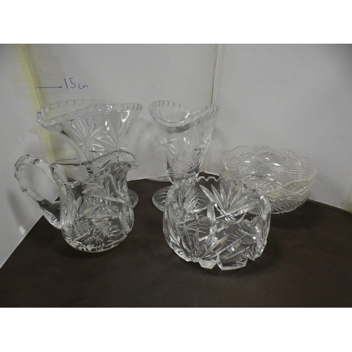 203A - Quantity of glassware to include two ice buckets, sugar and cream, vases, candlesticks, ship in a bo... 