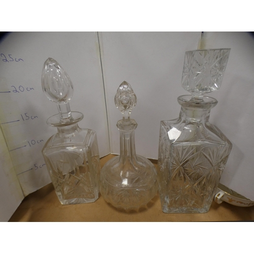 207A - Five assorted glass decanters and a jug.