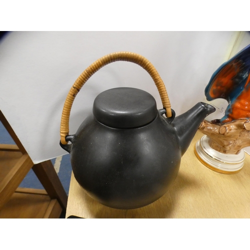 212 - Polychrome earthenware model of a parakeet and a teapot.