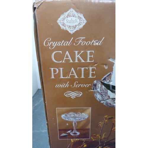 22 - Large crystal footed cake plate.