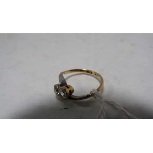 232 - Diamond cross-over ring set with old-cut brilliants, approximately .20ct and .35ct, approximately .5... 