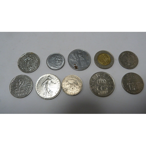 233 - Assorted coinage to include commemorative and world coins.