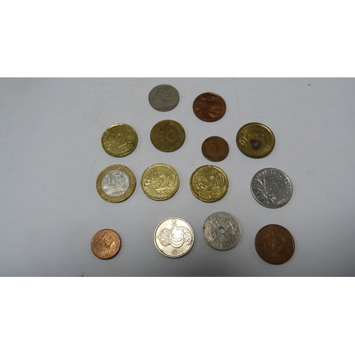 233 - Assorted coinage to include commemorative and world coins.