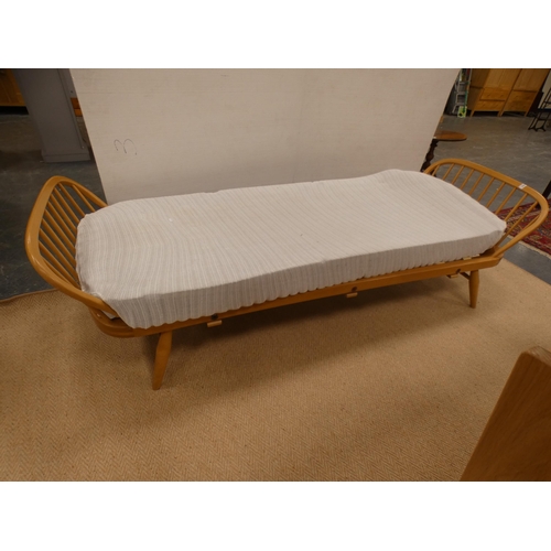 310 - Ercol blonde studio day bed.