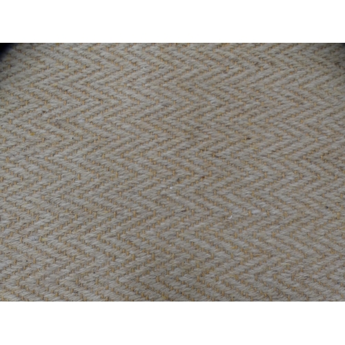 312 - Beige ground carpet.