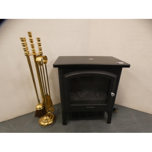 319 - Electric coal-effect fire and a brass companion set.