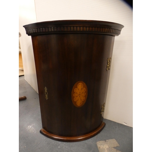 322 - Edwardian inlaid mahogany bow front corner cupboard.