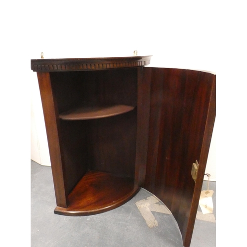 322 - Edwardian inlaid mahogany bow front corner cupboard.