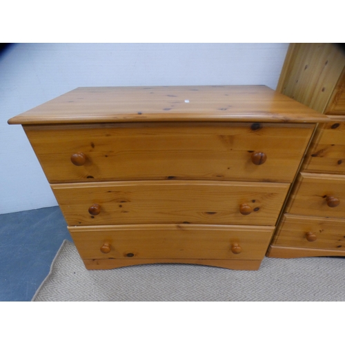 326 - Two pine chests of drawers. a pine dressing table with triple mirror and a dressing stool.